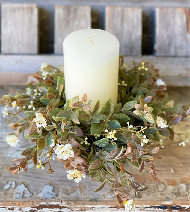 This collection features small, colorful rosettes peppered throughout a bed of lush greenery with little berry-like orbs.

8" | 3" Inner