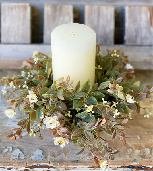 This collection features small, colorful rosettes peppered throughout a bed of lush greenery with little berry-like orbs.

8" | 3" Inner